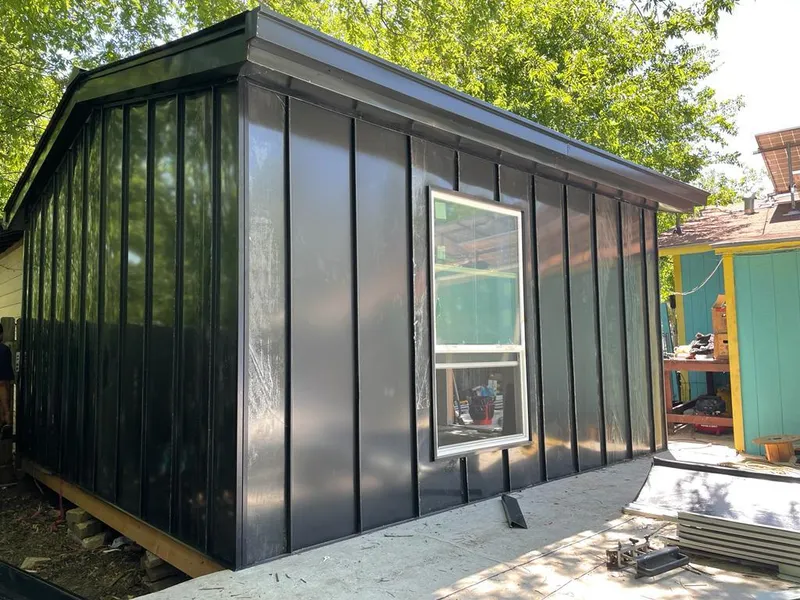 Black standing seam metal wall panels for Metal Roof Installation in Lincoln